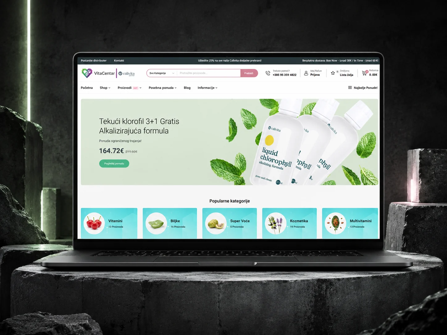 VitaCentar wellness and supplements e-commerce website displayed on a futuristic brutalist laptop mockup, web design by Nenad De Luxe